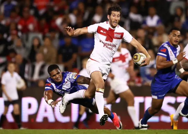 Stefan Ratchford pushes through the Samoan defence