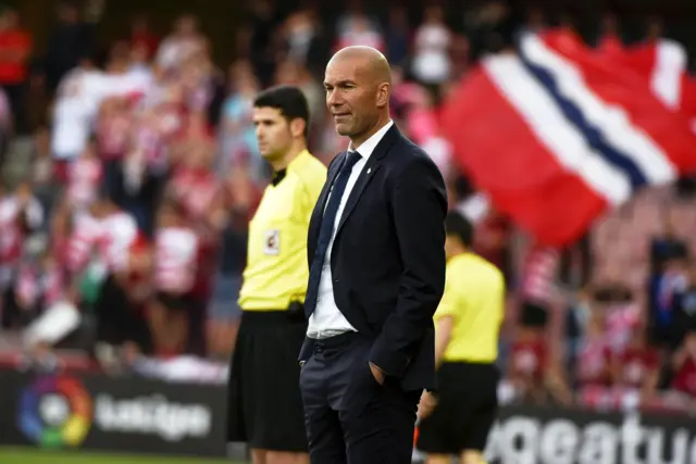 Zinedine Zidane watches on