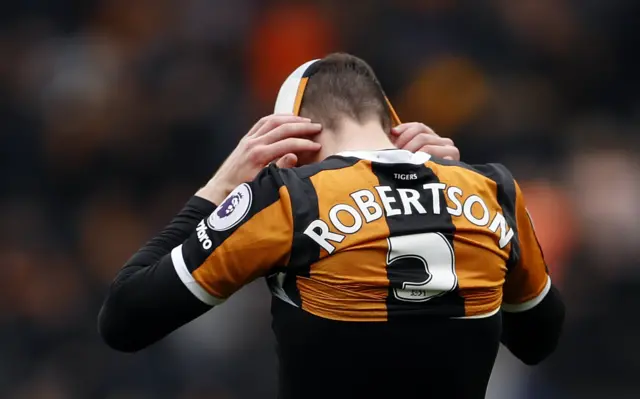 Andrew Robertson looks dejected