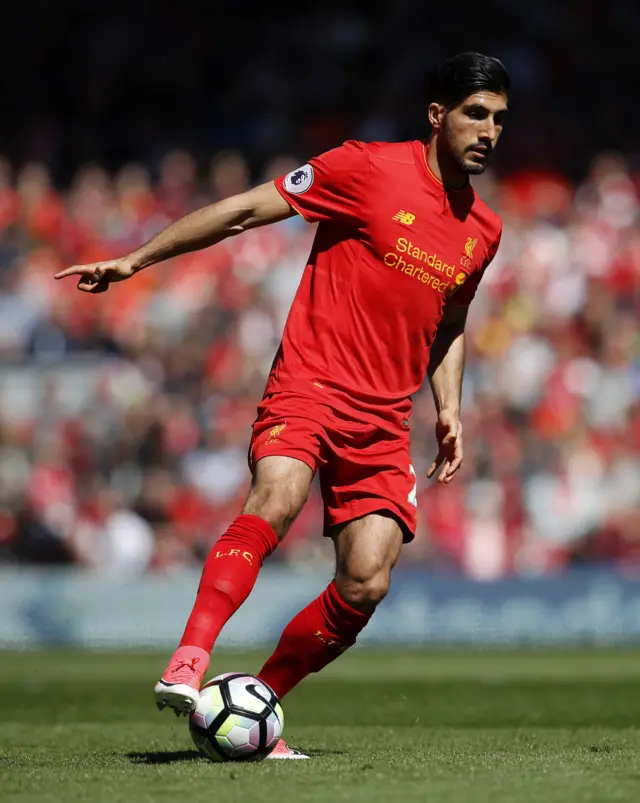 Emre Can holds the ball