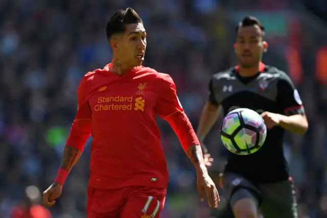 Liverpool Roberto Firmino watches on