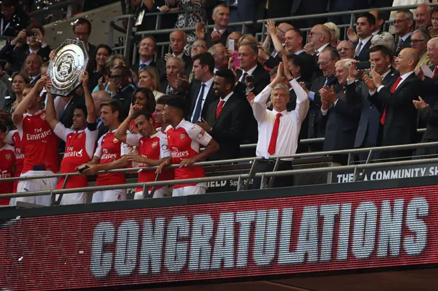 Arsene Wenger celebrates Community Shield win in 2015