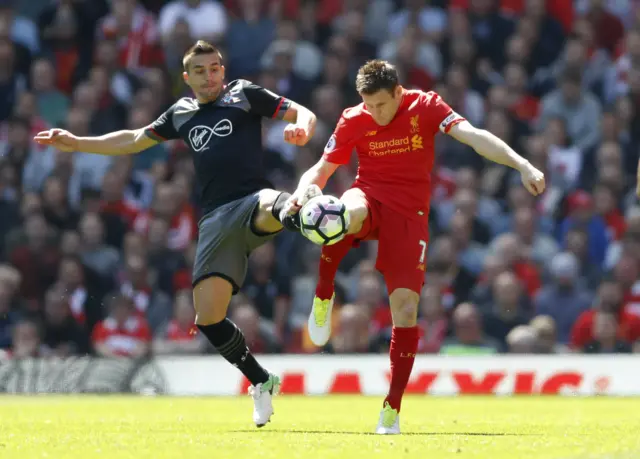 Milner in action with Tadic