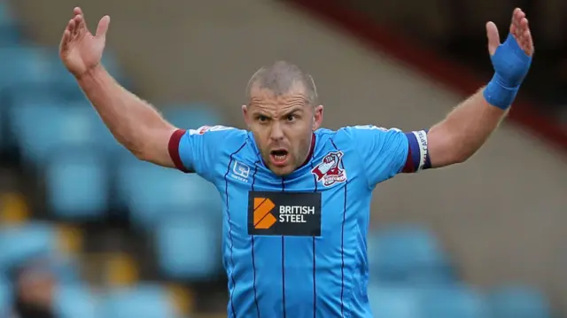 Stephen Dawson celebrates