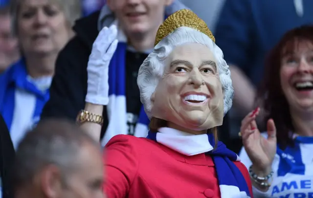 Brighton fan in Queen Elizabeth mask