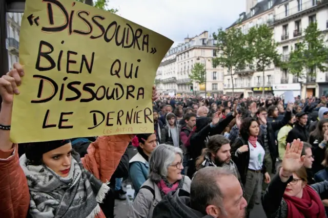 Demonstrators take part in a trade unions protest against the election of Emmanuel Marcon on May 8, 2017 in Paris