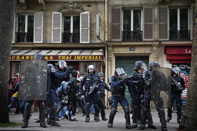 Police control demonstrators on a trade unions protest against the election of Emmanuel Macron on May 8, 2017 in Paris