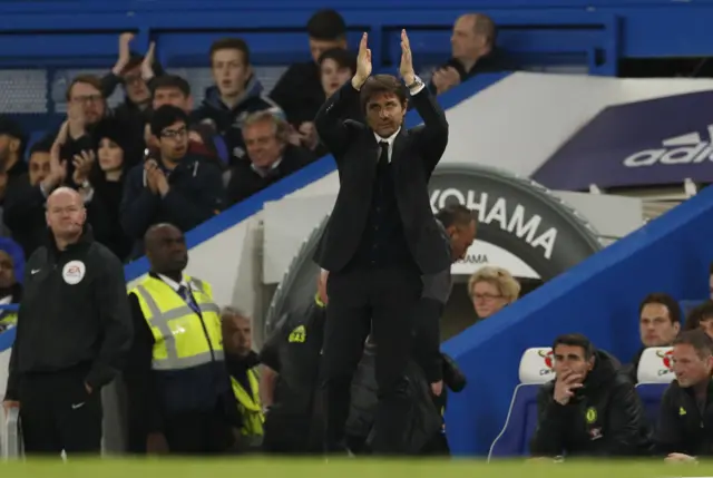 Antonio Conte applauds the fans