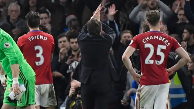 Antonio Conte applauds the Middlesbrough fans