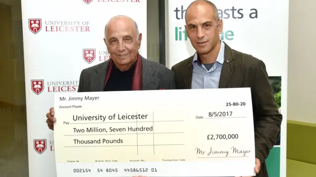 Jimmy and David Mayer with their £2.7m cheque