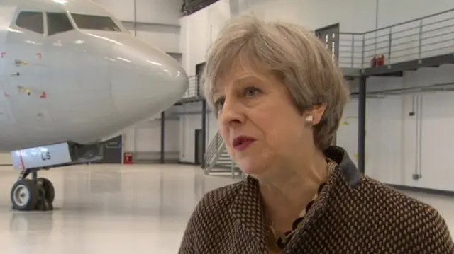 Theresa May at aviation academy in Norwich