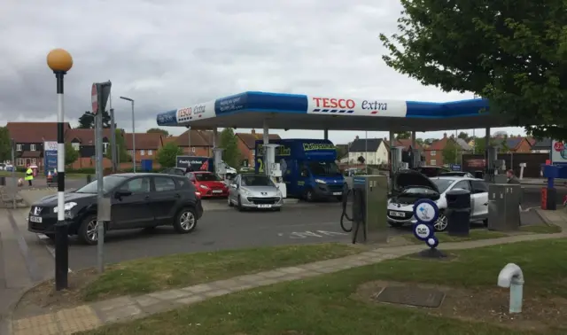 Vehicles on the petrol station forecourt