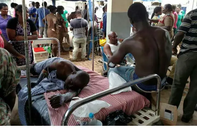Injured man lies on hospital bed
