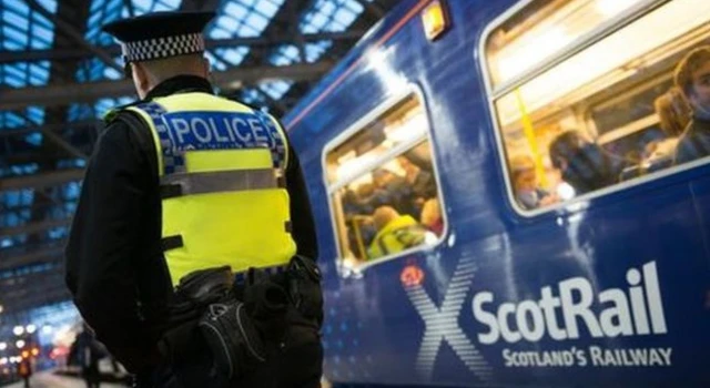 Police officer working at railway