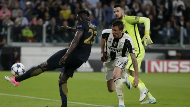 Monaco's Mendy clears after Mandzukic's missed opportunity