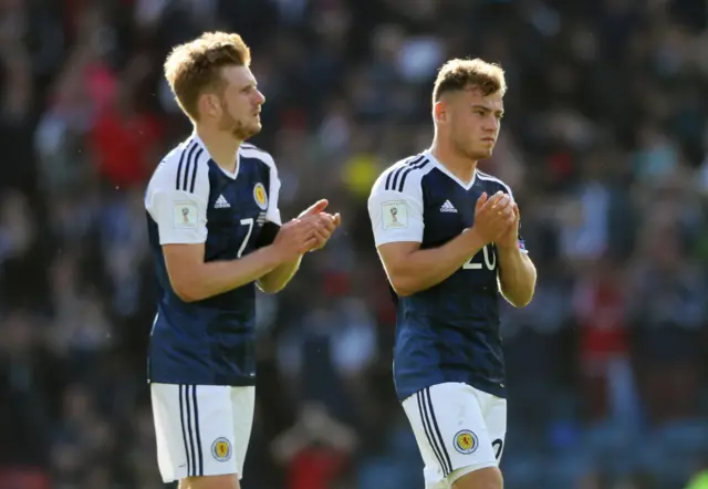 Scotland's Ryan Fraser and Stuart Armstrong applaud fans