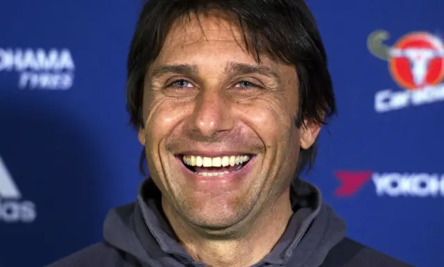 Antonio Conte smiles