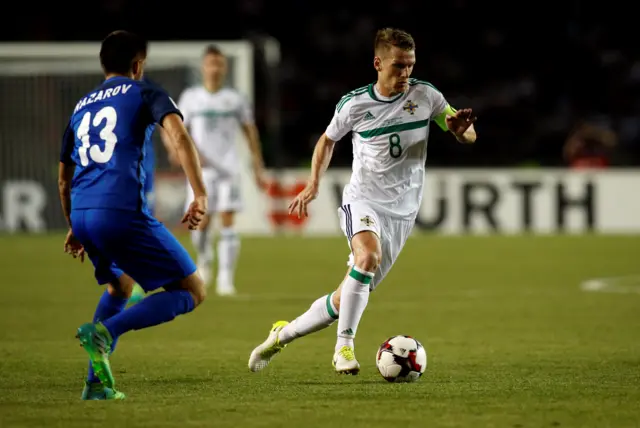 Steven Davis with possession