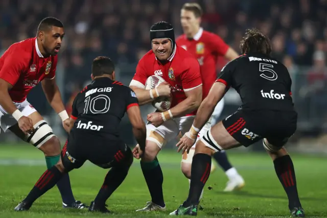 Sean O'Brien of the Lions carries the ball