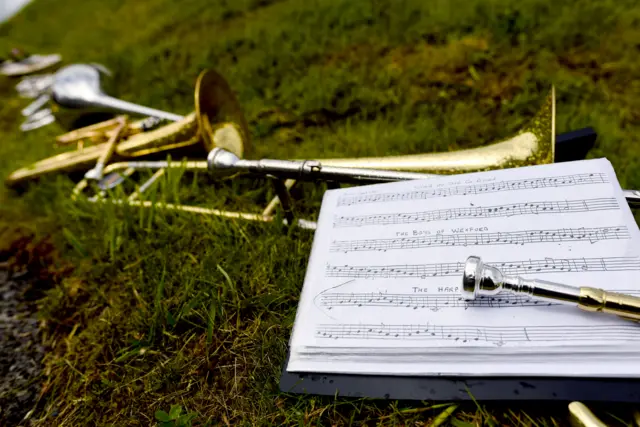 Musical instruments lying on the pitch at Kingspan Breffni