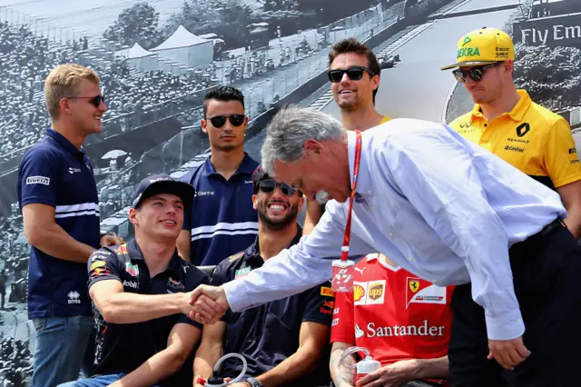 Chase Carey meets some of the drivers