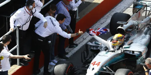 Lewis Hamilton and Toto Wolff celebrate