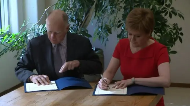 Jerry Brown and Nicola Sturgeon signed the agreement in Sacramento