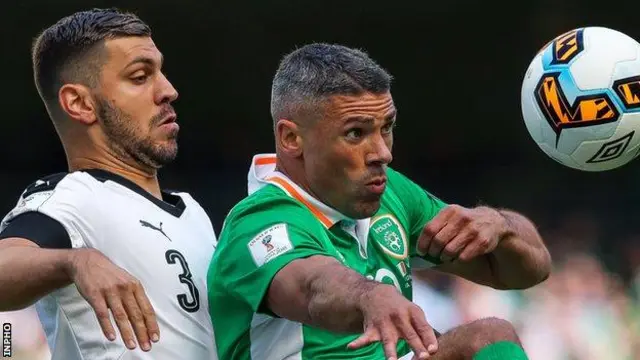 Jon Walters battling with Aleksandar Dragovic of Austria