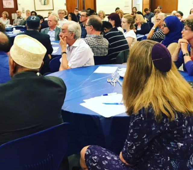 The rabbi and the man who recited the Muslim prayer sat next to each other listening to songs