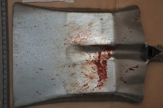 A blood-stained shovel was found next to Angela Wrightson