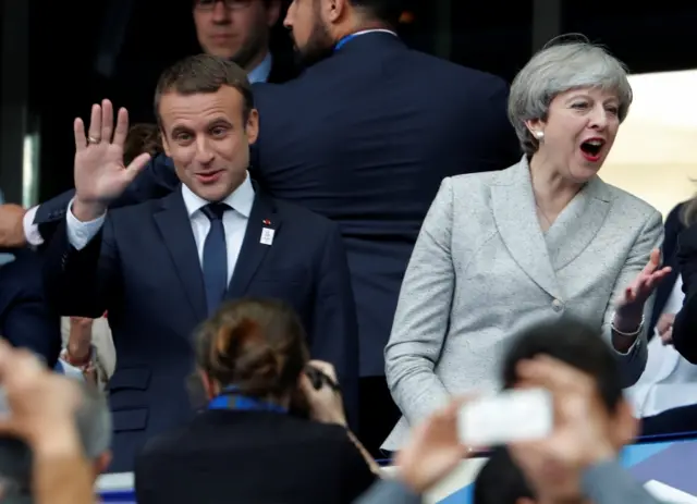 Emmanuel Macron and Theresa May