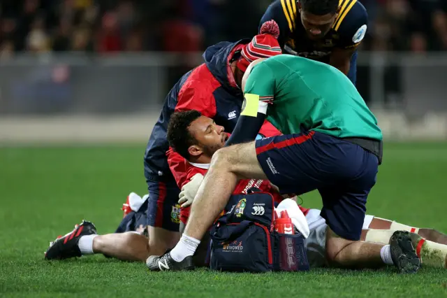 Courtney Lawes of the Lions receives medical attention