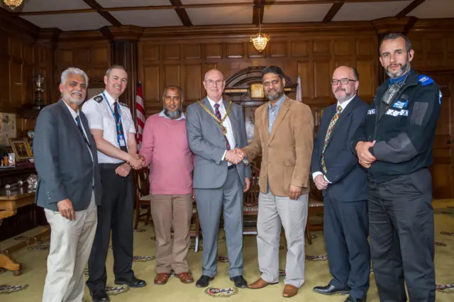 Councillor Steve Mackay and leaders of the Muslim community