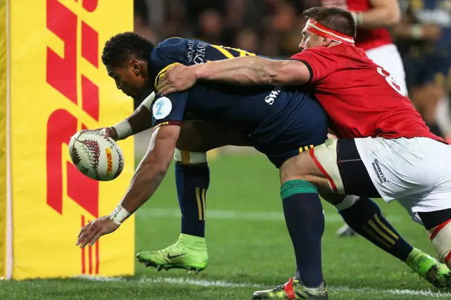 Waisake Naholo of the Highlanders dives over to score a try