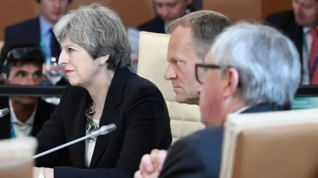 Theresa May with Donald Tusk and Jean-Claude Juncker