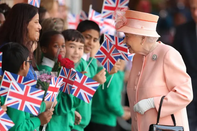 Queen meets school children at Slough station