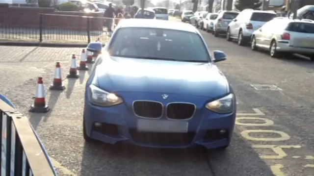 Car blocking school entrance