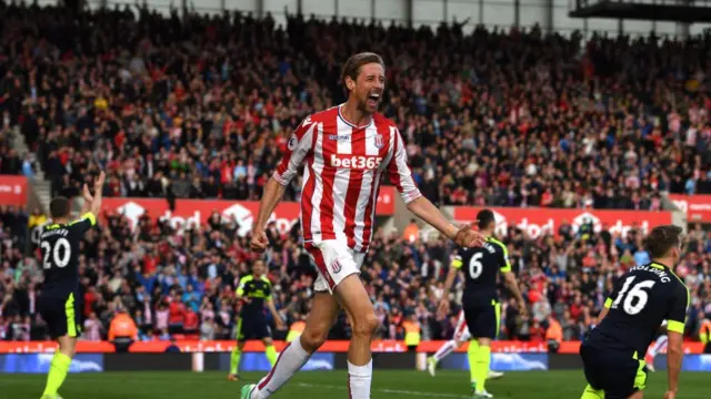 Peter Crouch celebrating a goal for Stoke City last season