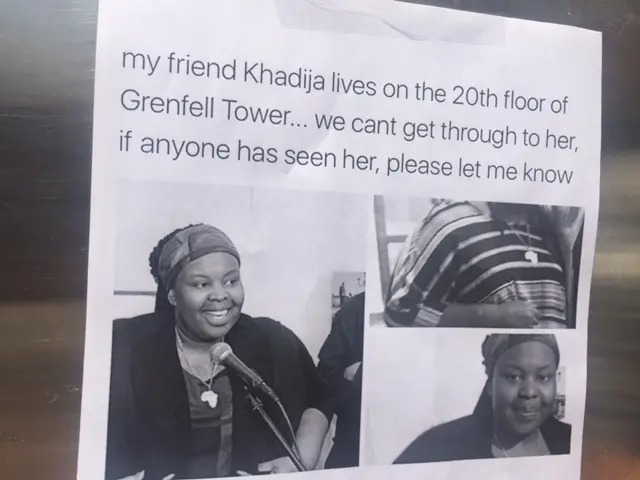 A poster near the Grenfell Tower fire asks for information on a woman named Khadija who lives on the 20th floor