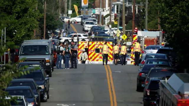 Police survey the scene after a gunman opened fire on Republican members of Congress during a baseball practice in Alexandria, Virginia