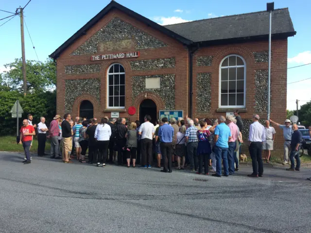 Crowd gathering for unveiling