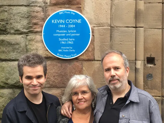 Kevin Coyne's sons and first wife with blue plaque