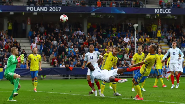 Tammy Abraham of England hooks a good chance over the bar