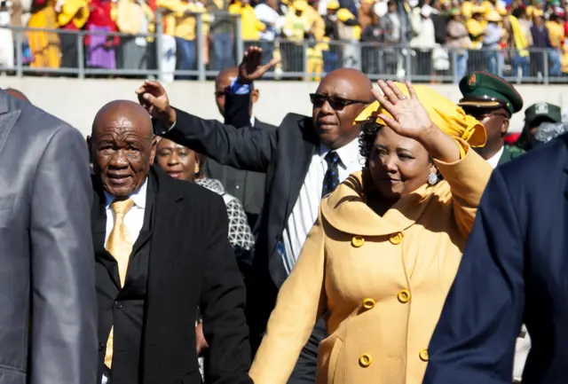 Newly appointed Lesotho prime Minister Thomas Thabane (L), leader of the All Basotho Convention (ABC) political party, and his wife "Ma Isaiah Ramoholi Thabane arrive to attend his inauguration on June 16, 2017 in Maseru