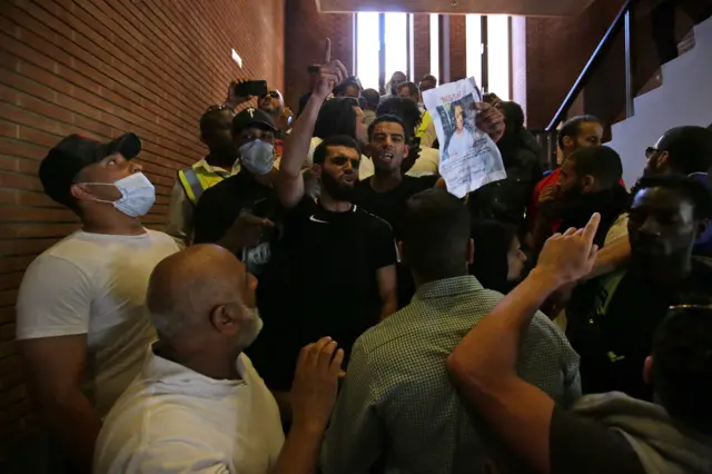 Demonstrators inside Kensington Town Hall