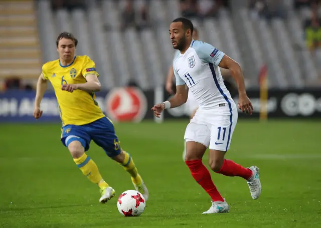 England's Nathan Redmond advances with possession