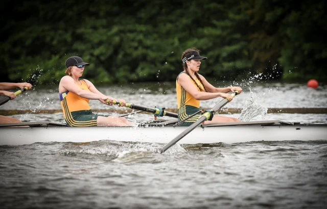 Women rowing