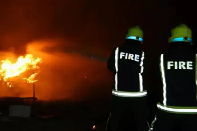 Firefighters attend to a fire at Kiveton Park.