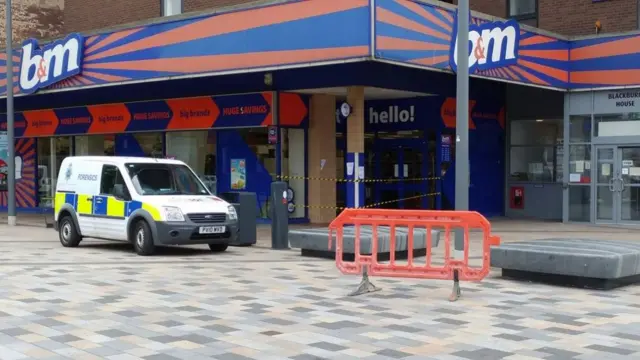 Police van outside B&M