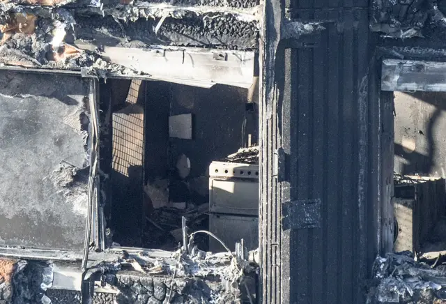 A charred kitchen after the fire